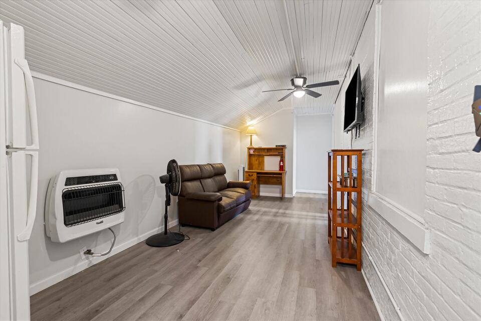 Long furnished lounge with leather sofa at The Hatfield House