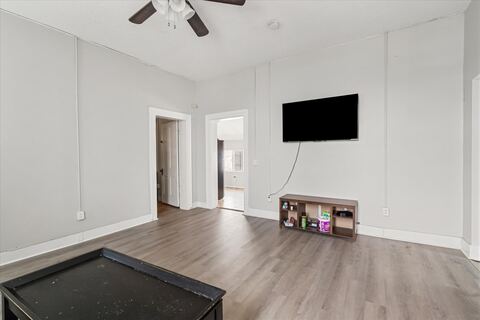 Furnished living room with wall-mounted TV