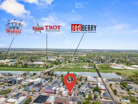 Aerial view labeling Hobart Arena, Troy High School, and redBERRY relative to the building